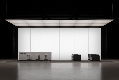 Minimal retail storefront mockup with blank white panels, counter seating, black display boxes, clean lighting