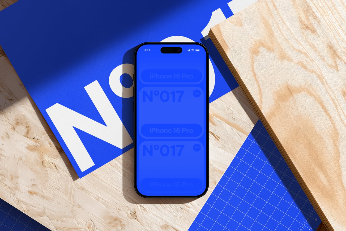 iPhone 14 Pro mockup on bright blue background with geometric design elements