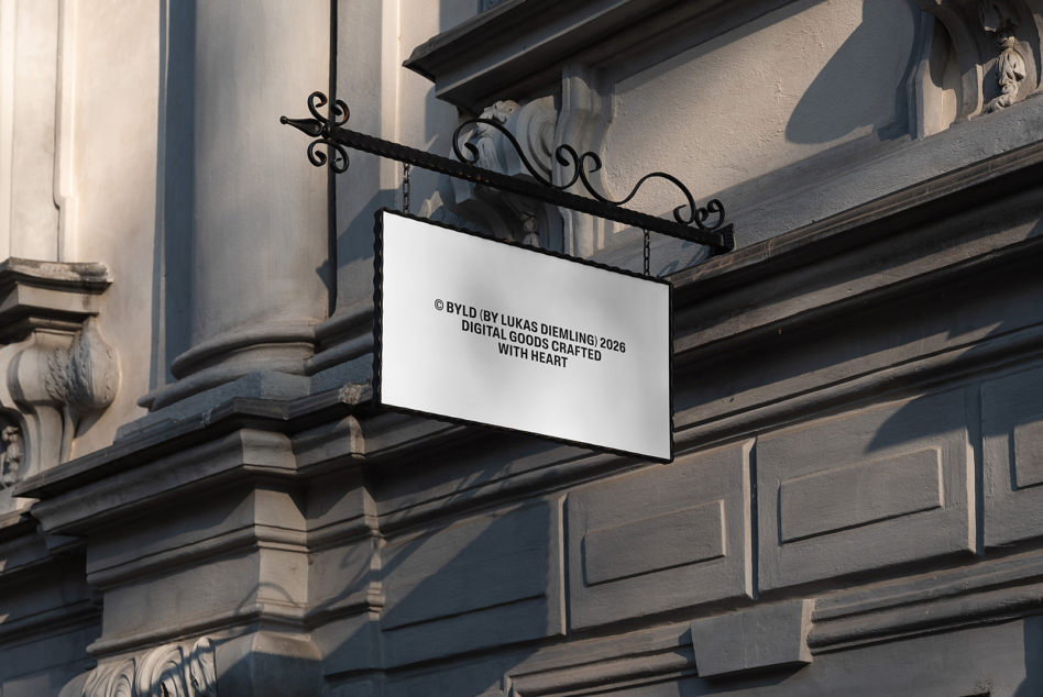 Horizontal storefront sign hanging from ornate black metal bracket on classical stone building facade