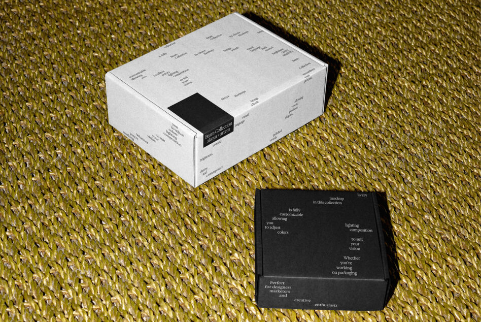 White box with black label detail shot next to open black box on textured yellow surface
