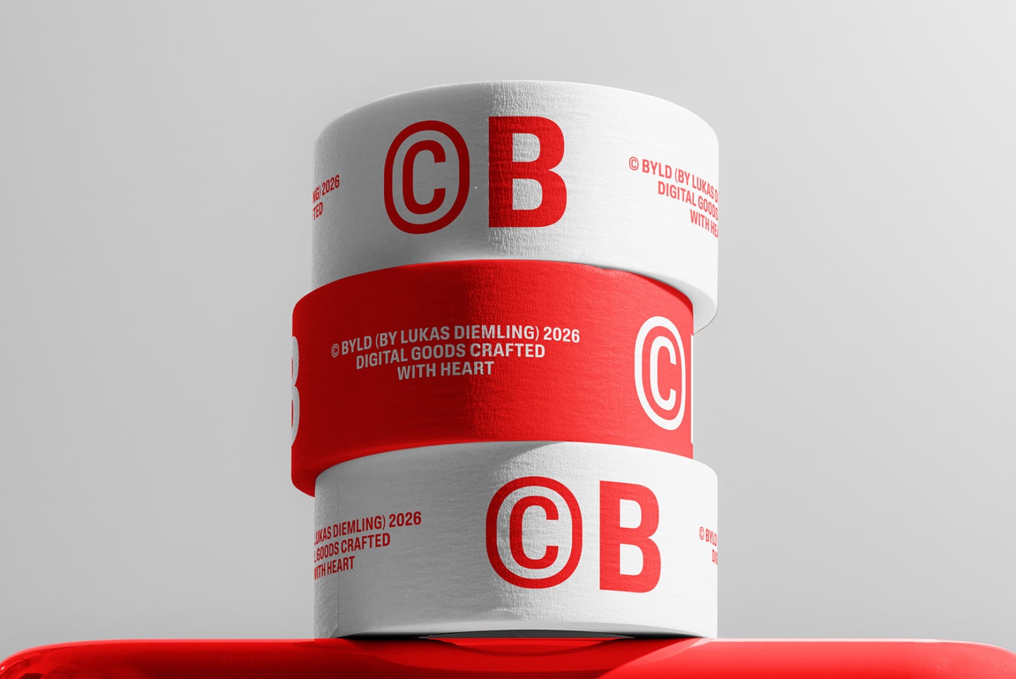 Stacked packing tape mockup with red, white branding showing logo wraps from different angles