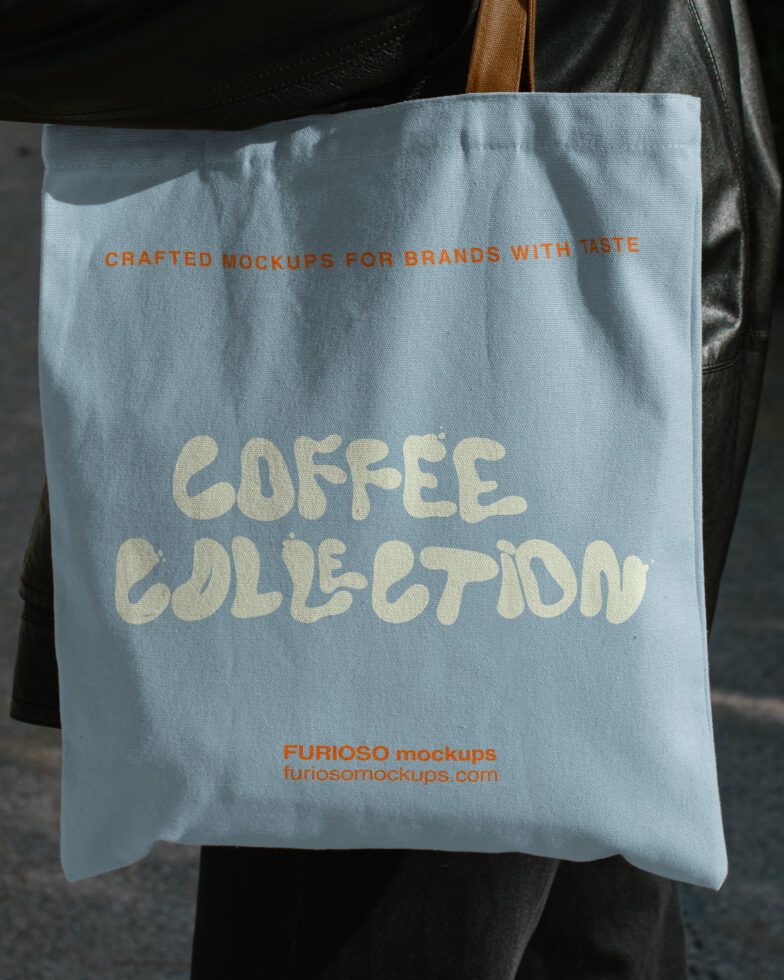 Light blue canvas tote with cream retro lettering reads "Coffee Collection"