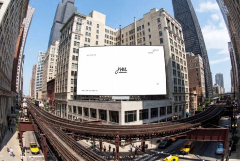 Wide billboard mockup on Chicago street with elevated train, vintage buildings, blue sky