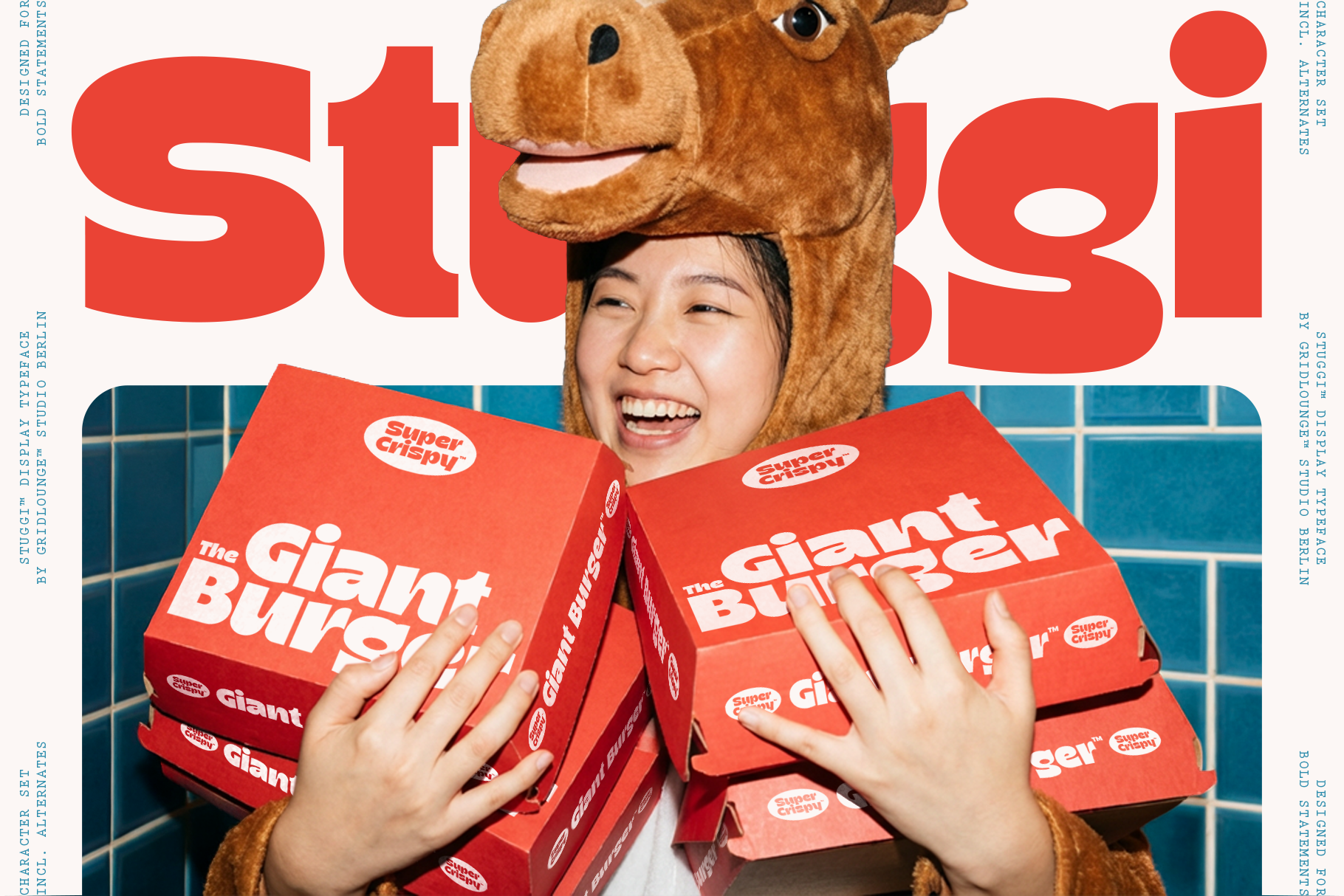 Smiling person wearing goofy brown llama head mask holding giant red cereal boxes