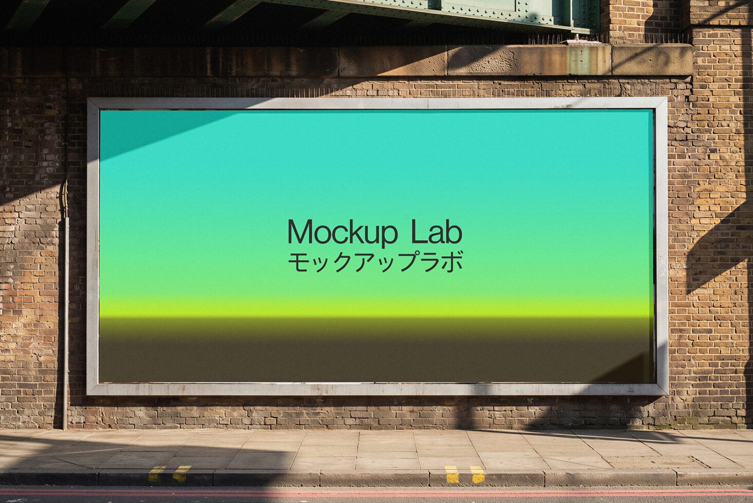 Billboard mockup on brick wall with turquoise gradient display showing text in English plus Japanese characters