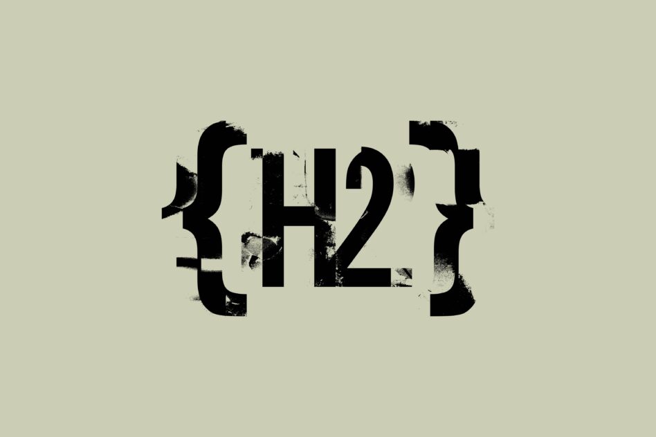 Bold sans serif typeface with distressed texture on cream background
