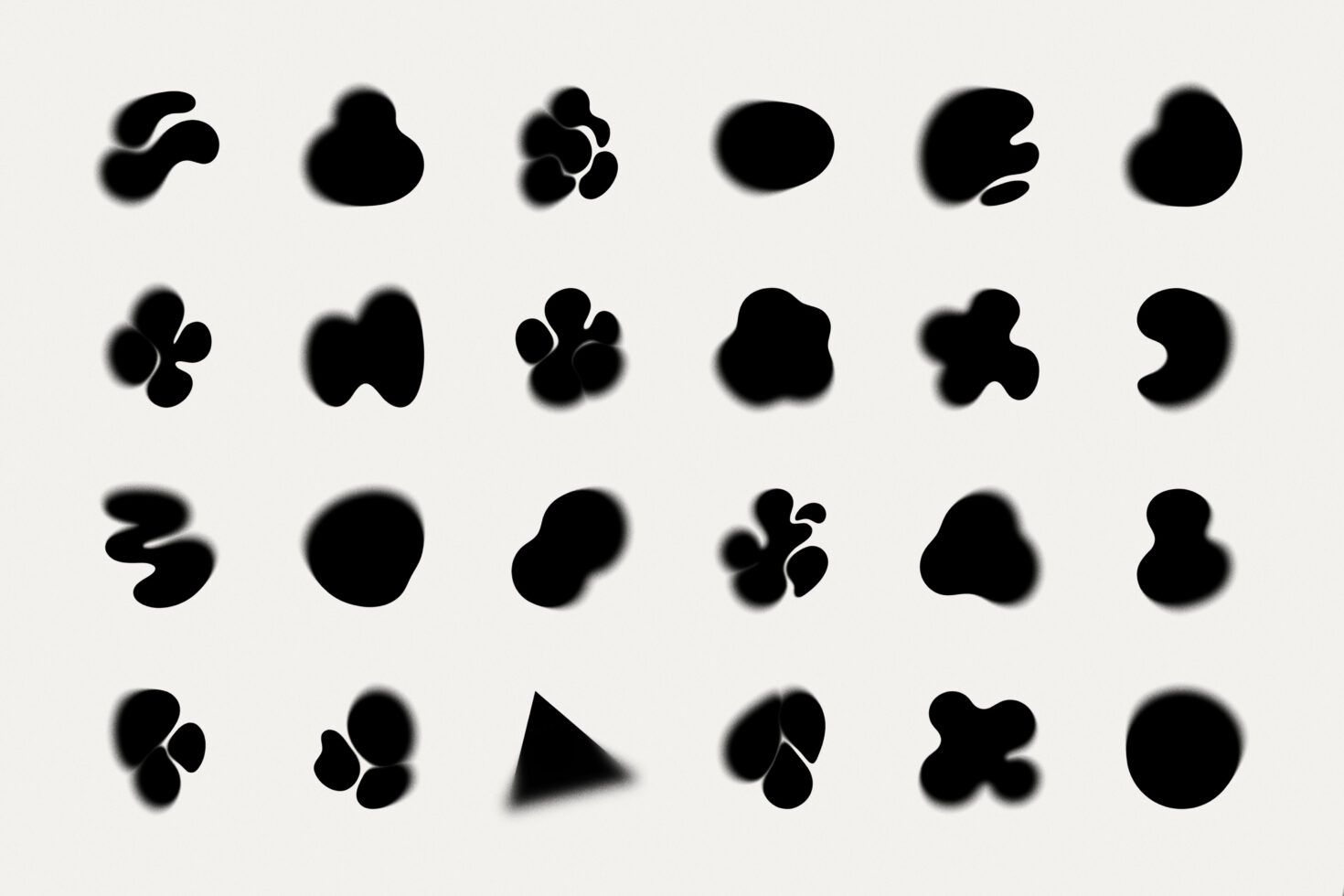 Blurry black blob shapes in rows, organic forms with soft edges on light bg