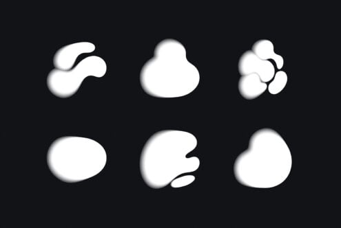 Six white organic blob shapes with soft shadows on dark background