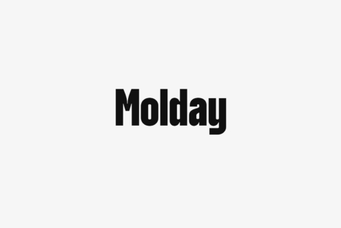 Bold sans serif typeface with tight letterforms on light background