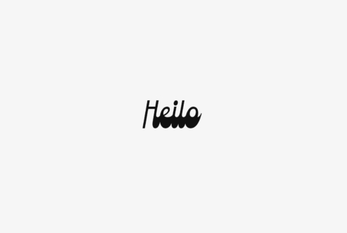 Heilo script font with playful shadow effect on light background