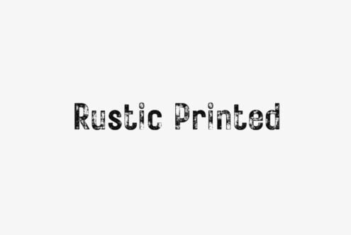 Distressed black typeface spelling out Rustic Printed on light gray background