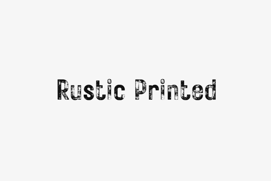 Distressed black typeface spelling out Rustic Printed on light gray background