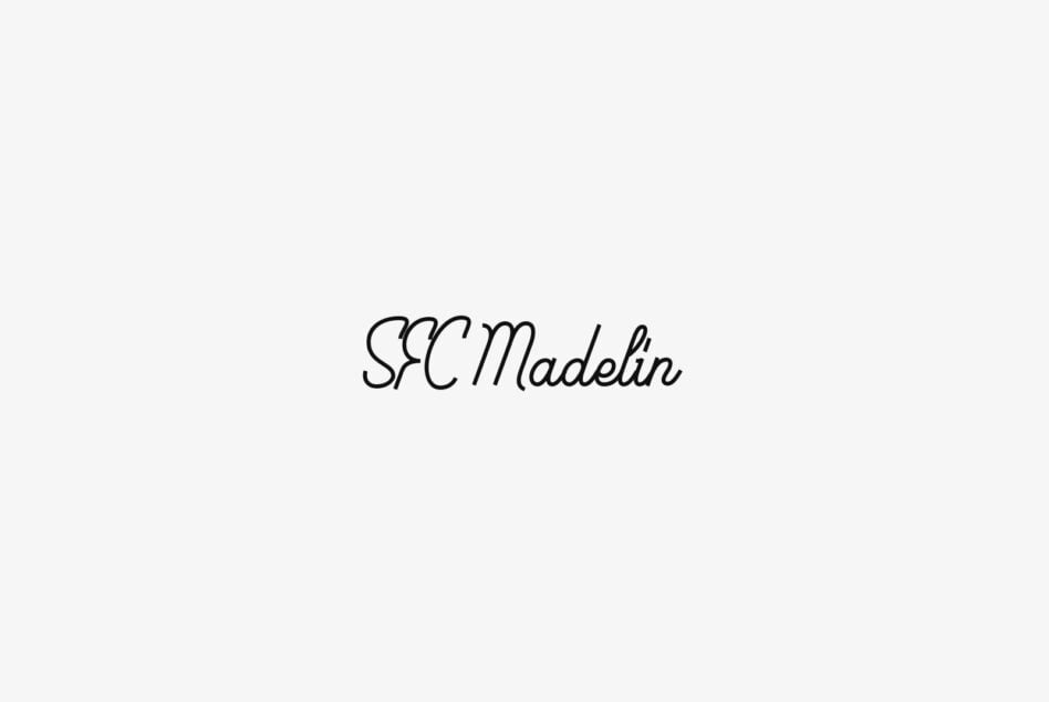 SFC Madelin handwritten script font in elegant flowing strokes on light background