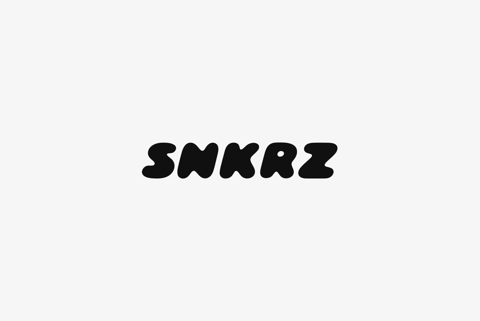 Bold black organic typeface with wavy letterforms on light gray background