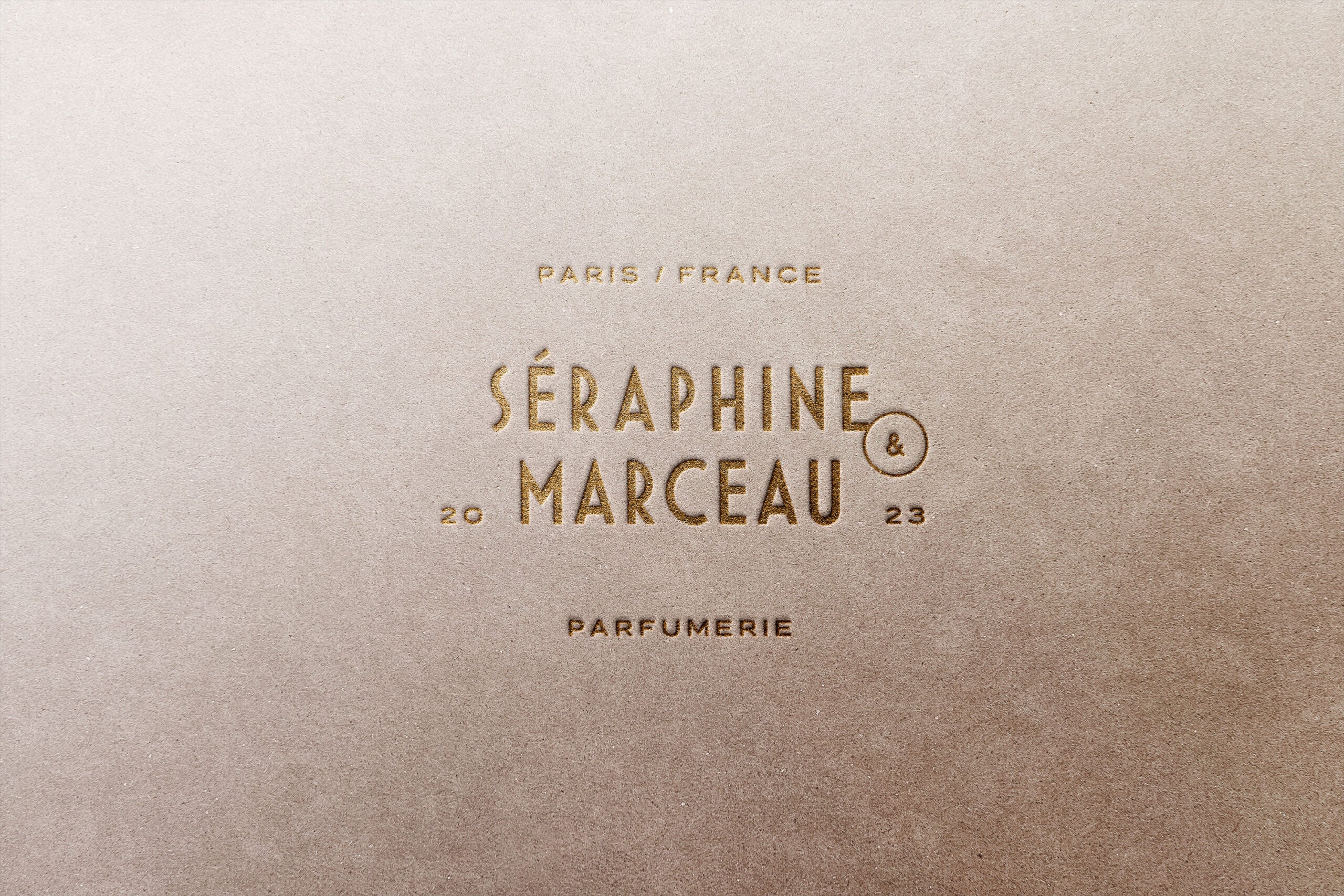 Gold foil embossed text on cream paper reading "Séraphine Marceau" with Paris address
