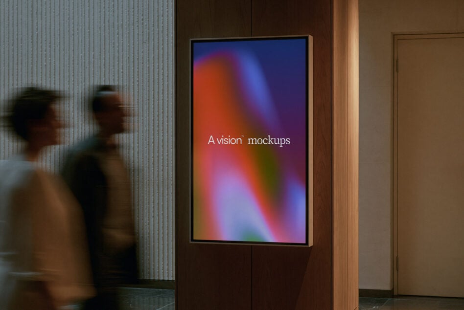 Wall-mounted display with vibrant gradient showing text overlay in modern lobby setting