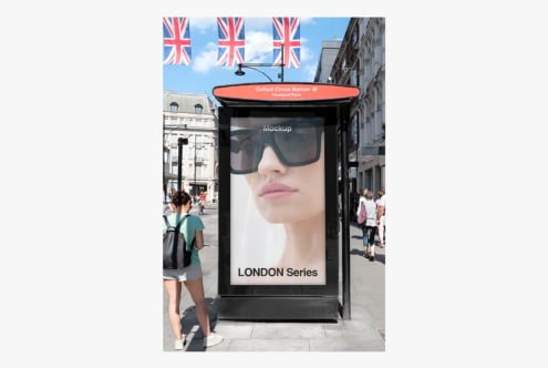 Street level advertising mockup showing bus shelter display at Oxford Circus London station with Union Jack flags
