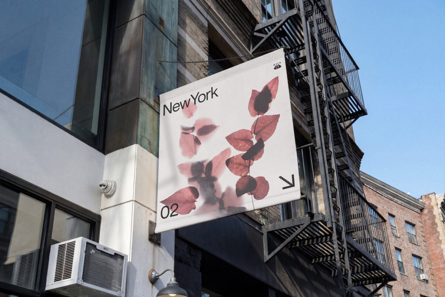 Street sign mockup with blurred red leaves, New York typography, mounted on urban building facade