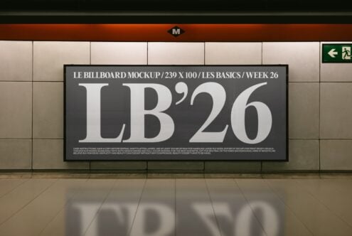 Billboard mockup in subway station showing large serif typography on dark background
