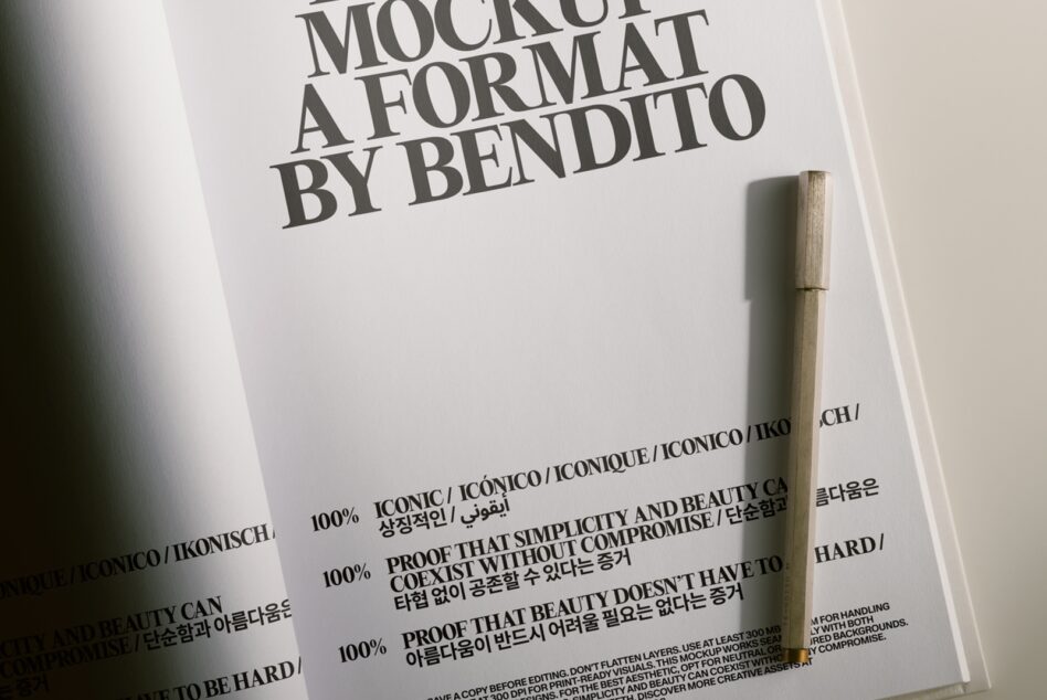 Oversized typography on white paper with wooden pen, Bendito mockup design template