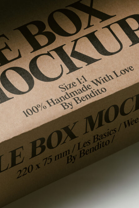 Kraft box mockup with bold serif type showing handmade branding details in angled view
