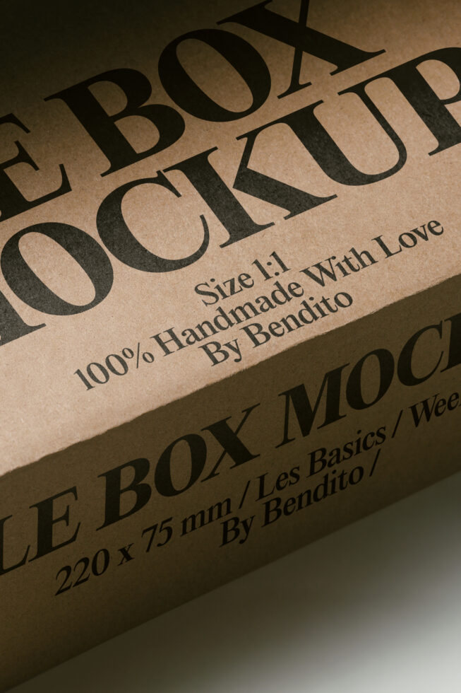 Kraft box mockup with bold serif type showing handmade branding details in angled view