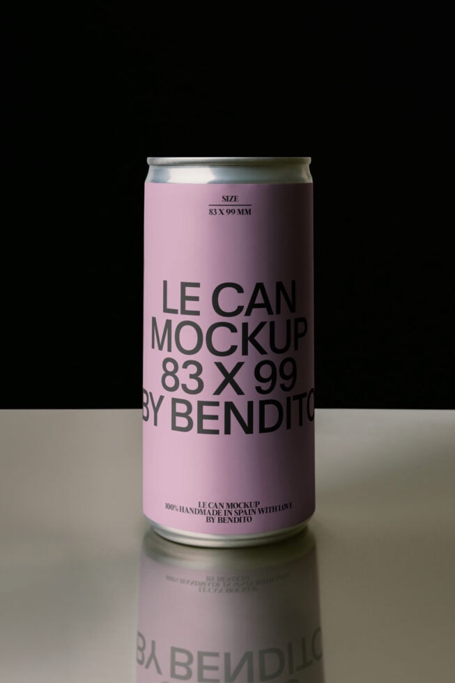 Pink aluminum can mockup with metallic top on neutral surface with reflection