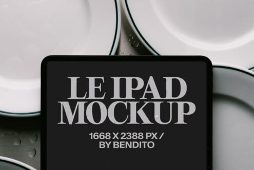 iPad mockup displaying serif typography on black screen with minimal styling setup