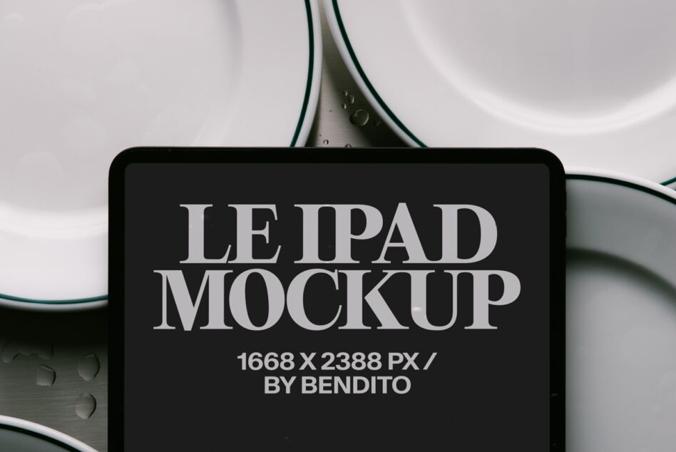 iPad mockup displaying serif typography on black screen with minimal styling setup