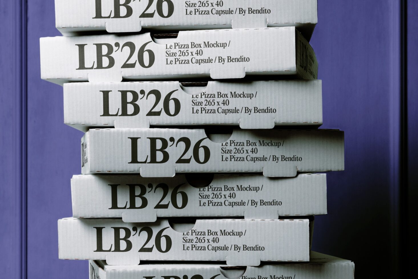 Stacked pizza boxes mockup showing white corrugated boxes with dark text labels against purple backdrop