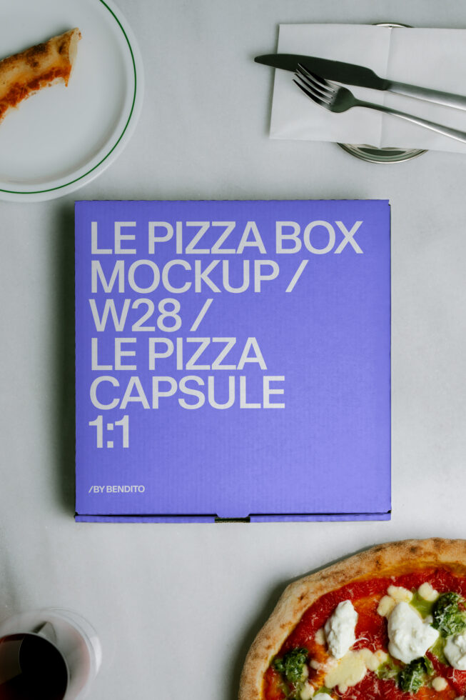 Bright purple pizza box mockup shot flat lay with fresh pizza, place setting, plus knife fork on white surface