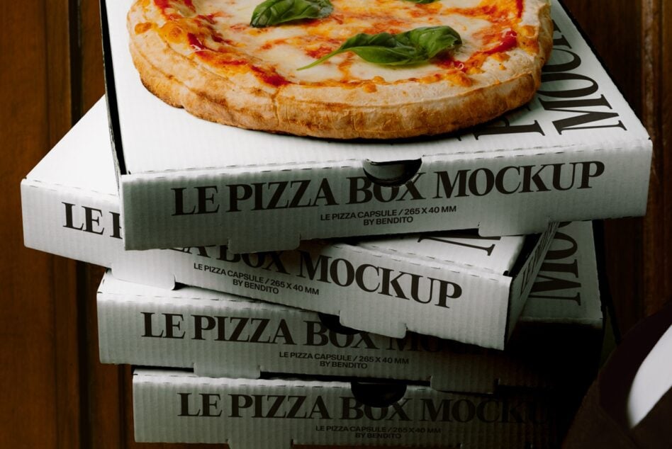 Stacked pizza boxes with fresh margherita on top, Le Pizza Box Mockup by Bendito