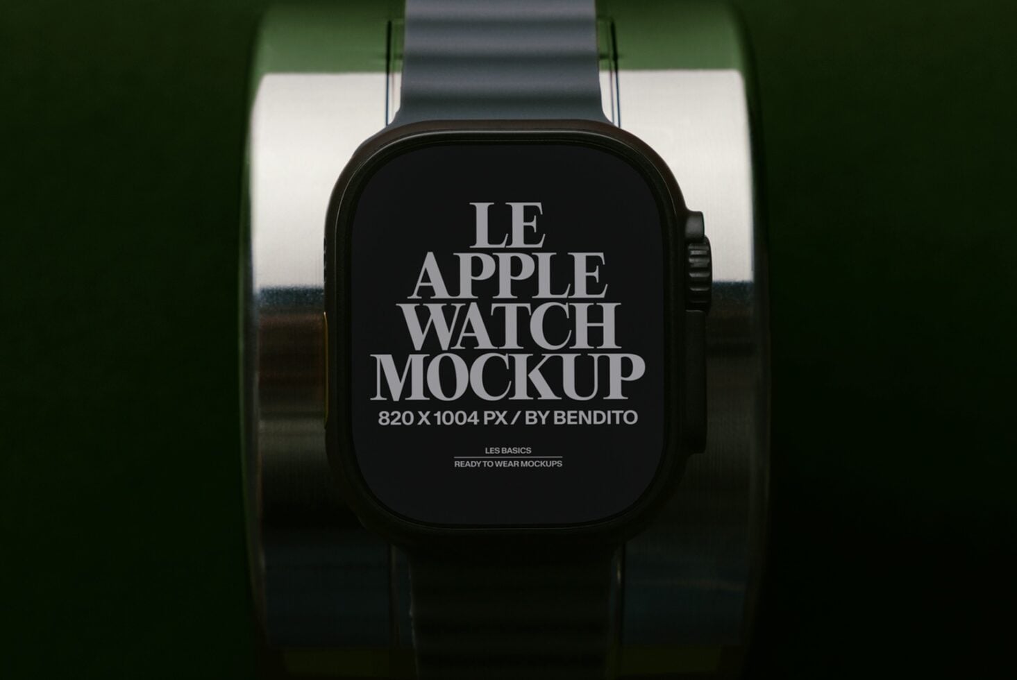 Black Apple Watch with dark band displaying serif typography mockup on green backdrop