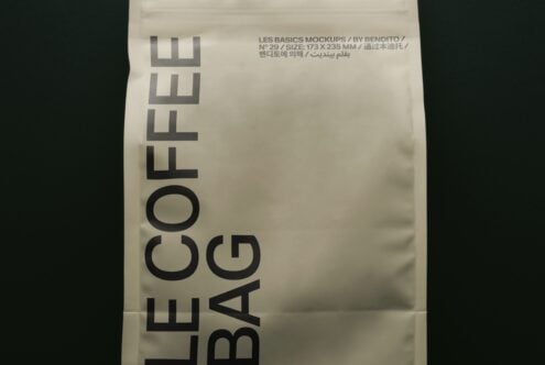 Crumpled paper bag with bold sans serif typography reading Les Basics mockup by Bendito