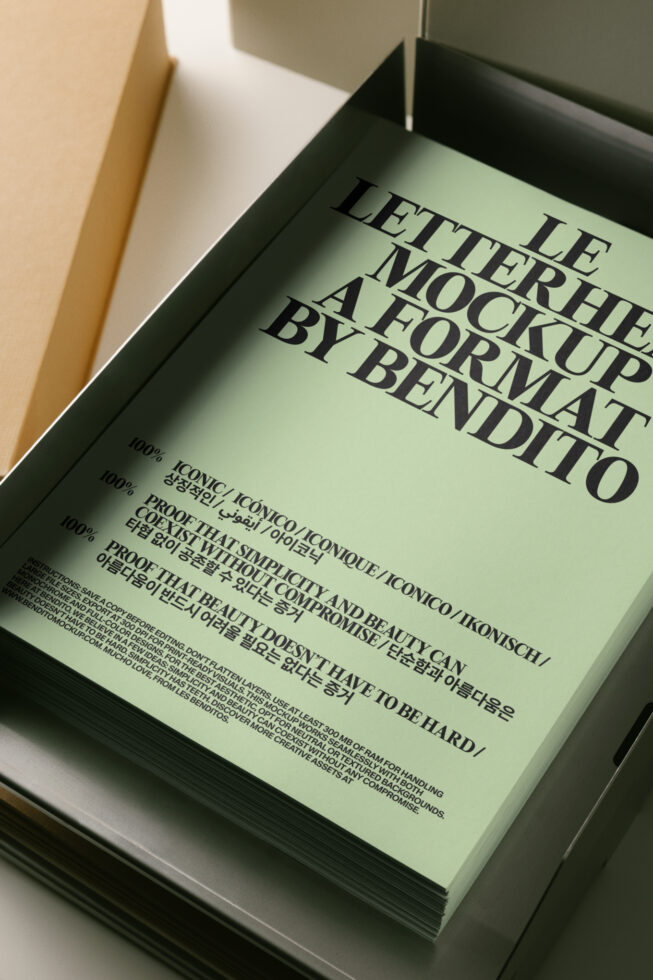Stacked letterpress mockup with mint green paper in dark tray, multilingual text visible