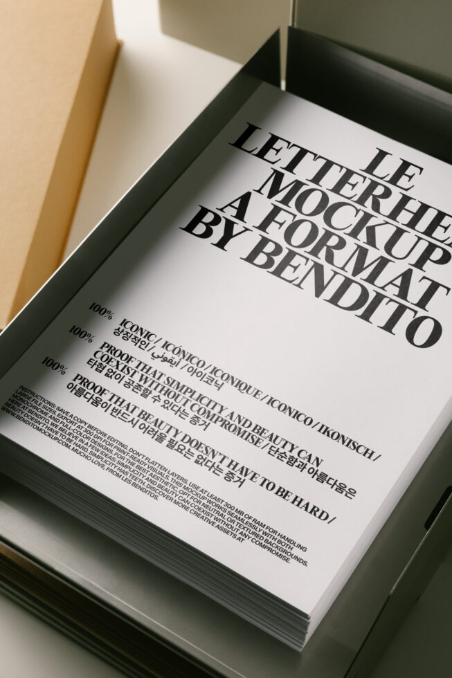 Letterhead mockup stacked in dark tray with serif typography, multilingual text, minimal styling