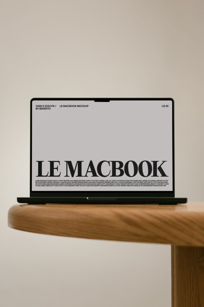 MacBook Pro mockup on wooden table with beige background showing screen display