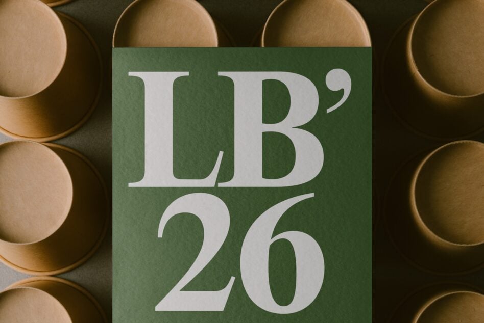 Green card mockup with serif typography surrounded by natural wood bowls