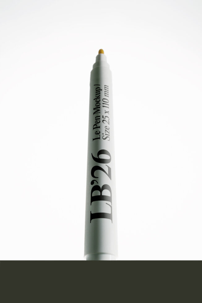 Le Pen marker mockup with gold tip on minimal white background