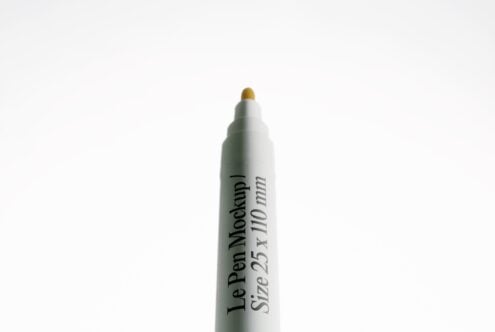 Le Pen Mockup Size 25 x 110 mm with gold tip on white background