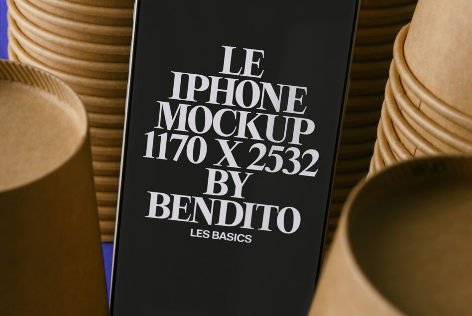 iPhone mockup on black screen surrounded by beige ceramic vases in warm studio lighting