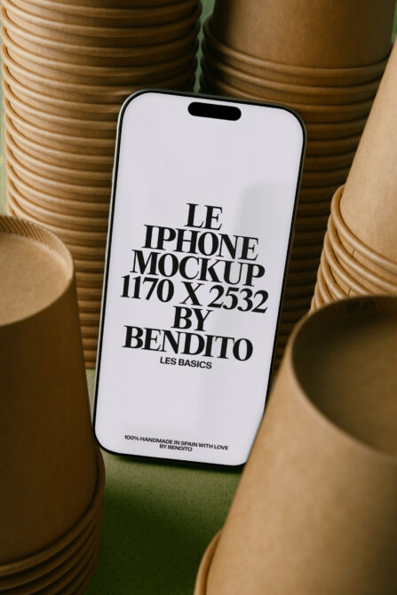 iPhone 14 Pro mockup surrounded by wooden baskets on green surface