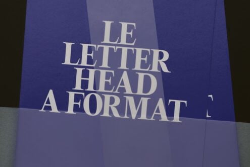 Cream serif text reading "LE LETTER HEAD A FORMAT" layered on folded purple paper mockup