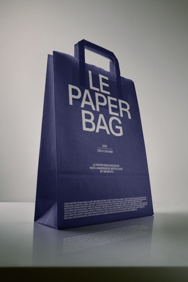 Navy paper bag mockup with handles, 250x335mm size displayed at angle