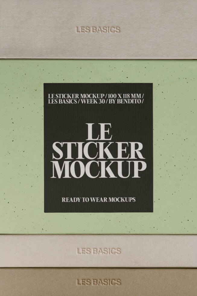 Black sticker on sage green textured background with tan borders showing typography layout
