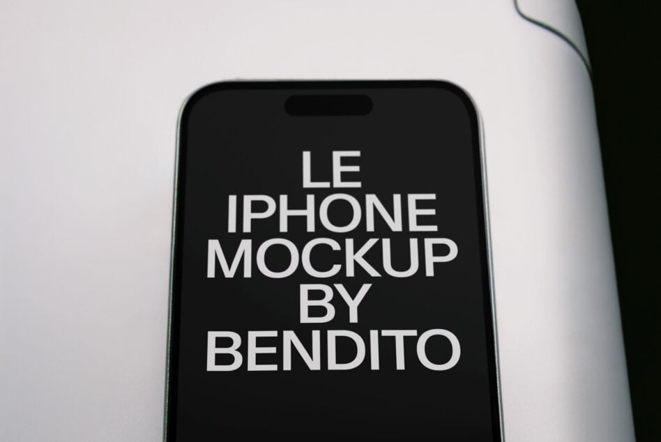 iPhone mockup with centered white sans-serif text on black screen against neutral background