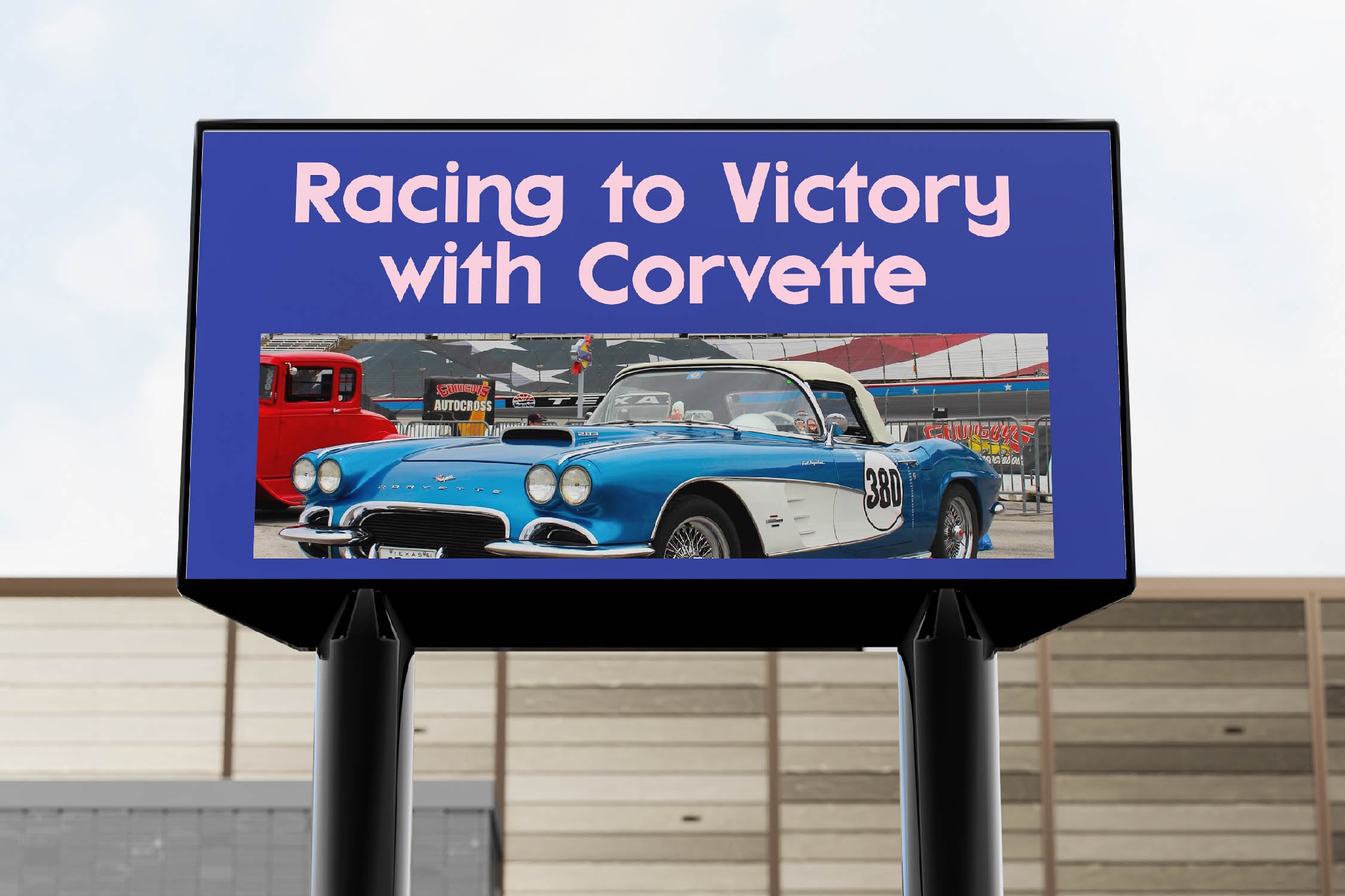 Billboard mockup showing vintage Corvette on blue background with racing text