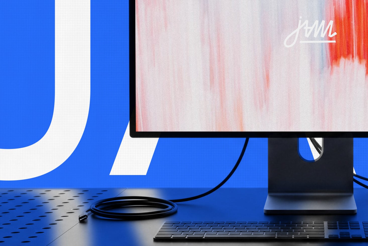 Desktop setup mockup with monitor displaying watercolor gradient, keyboard, cable on vibrant blue striped surface
