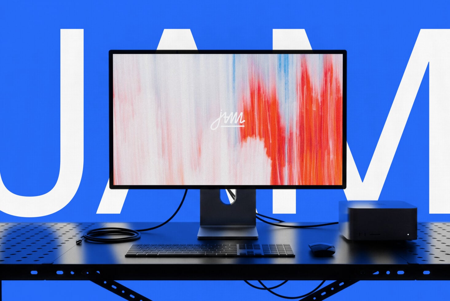 Desktop setup mockup with monitor displaying red gradient texture, keyboard, mouse on blue background
