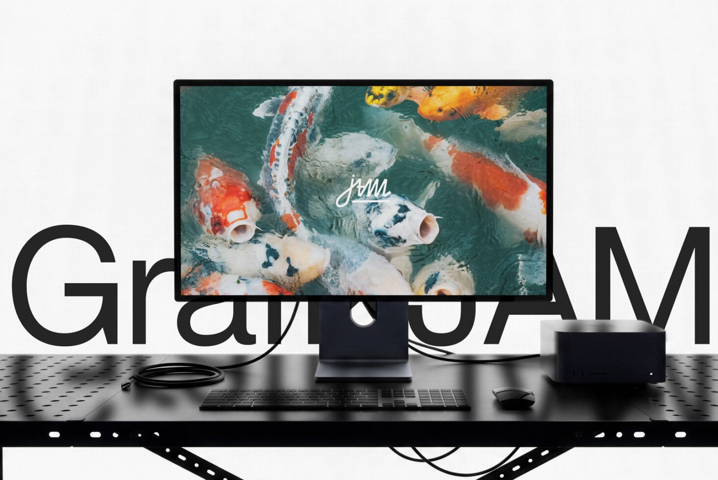 Desktop monitor mockup showing koi fish imagery with handwritten script overlay on screen